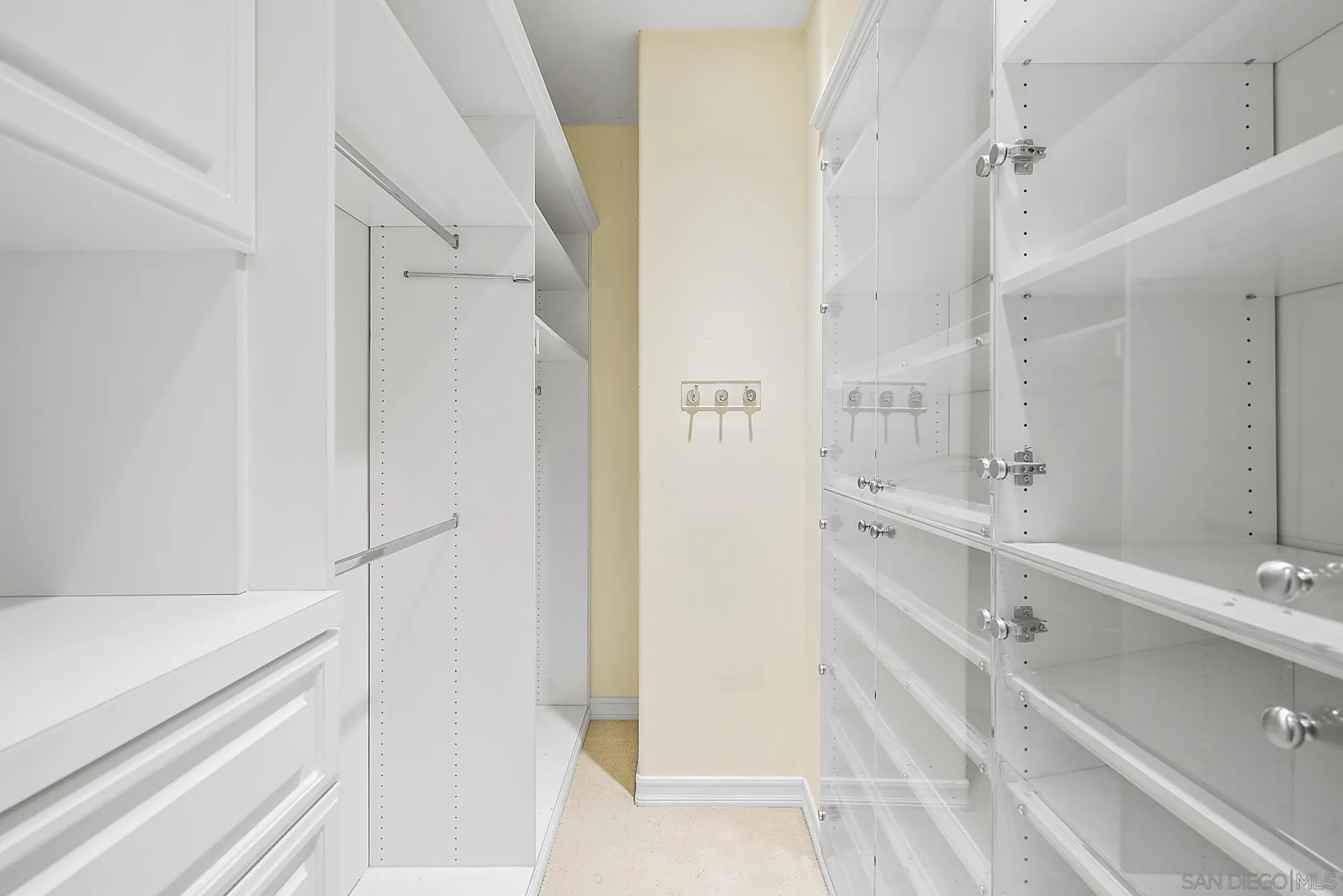 7836 Ivanhoe Avenue La Jolla, CA 92037 - Photo 19 of 31 a bathroom with a bathtub and a sink