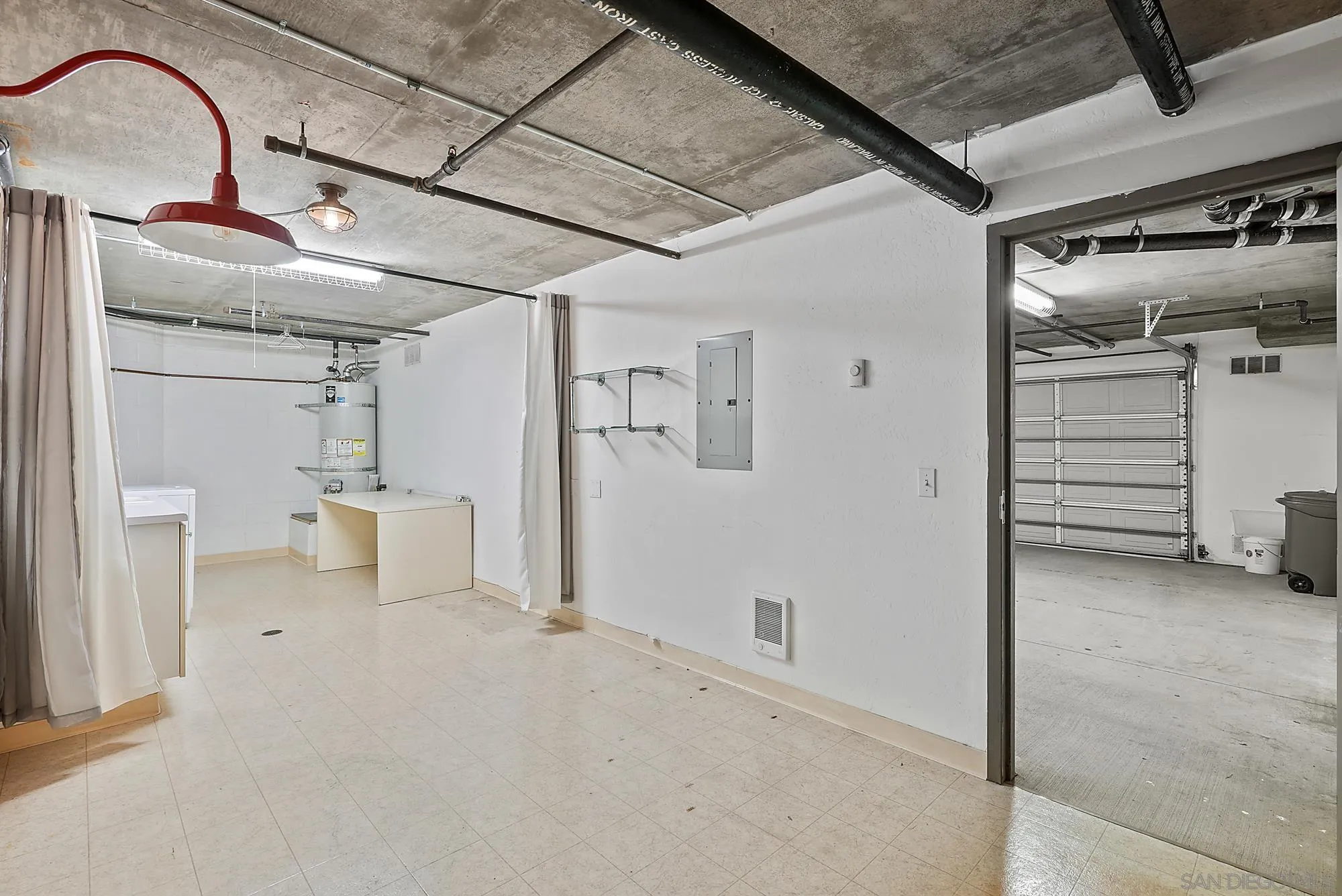 7836 Ivanhoe Avenue La Jolla, CA 92037 - Photo 26 of 31 a view of a livingroom with table and chair