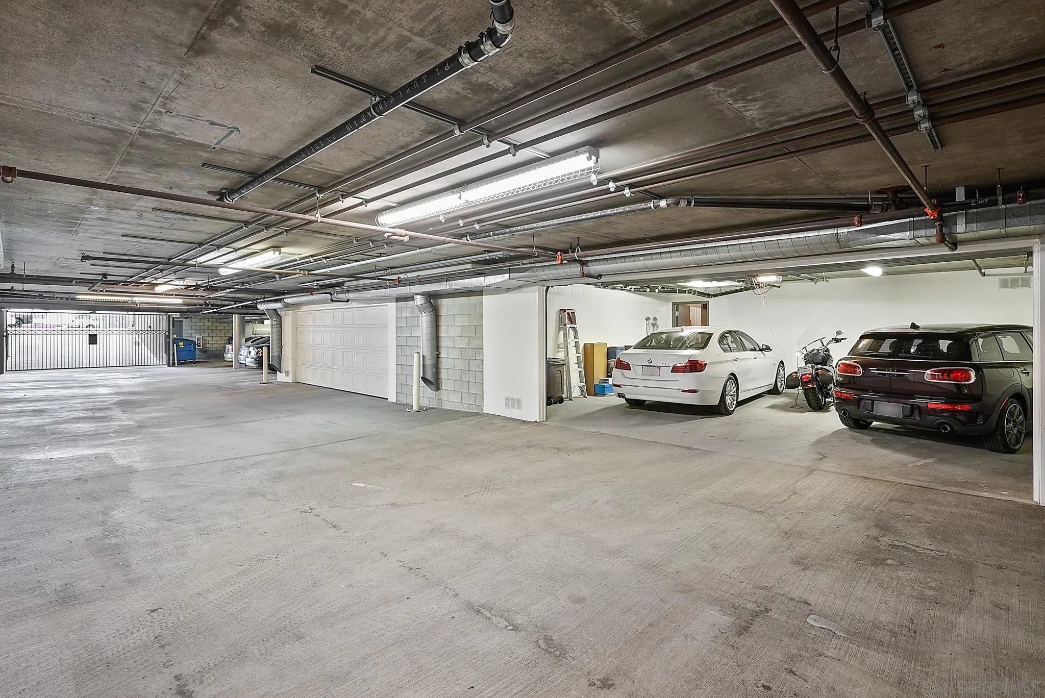7836 Ivanhoe Avenue La Jolla, CA 92037 - Photo 28 of 31 a view of cars parked in a parking