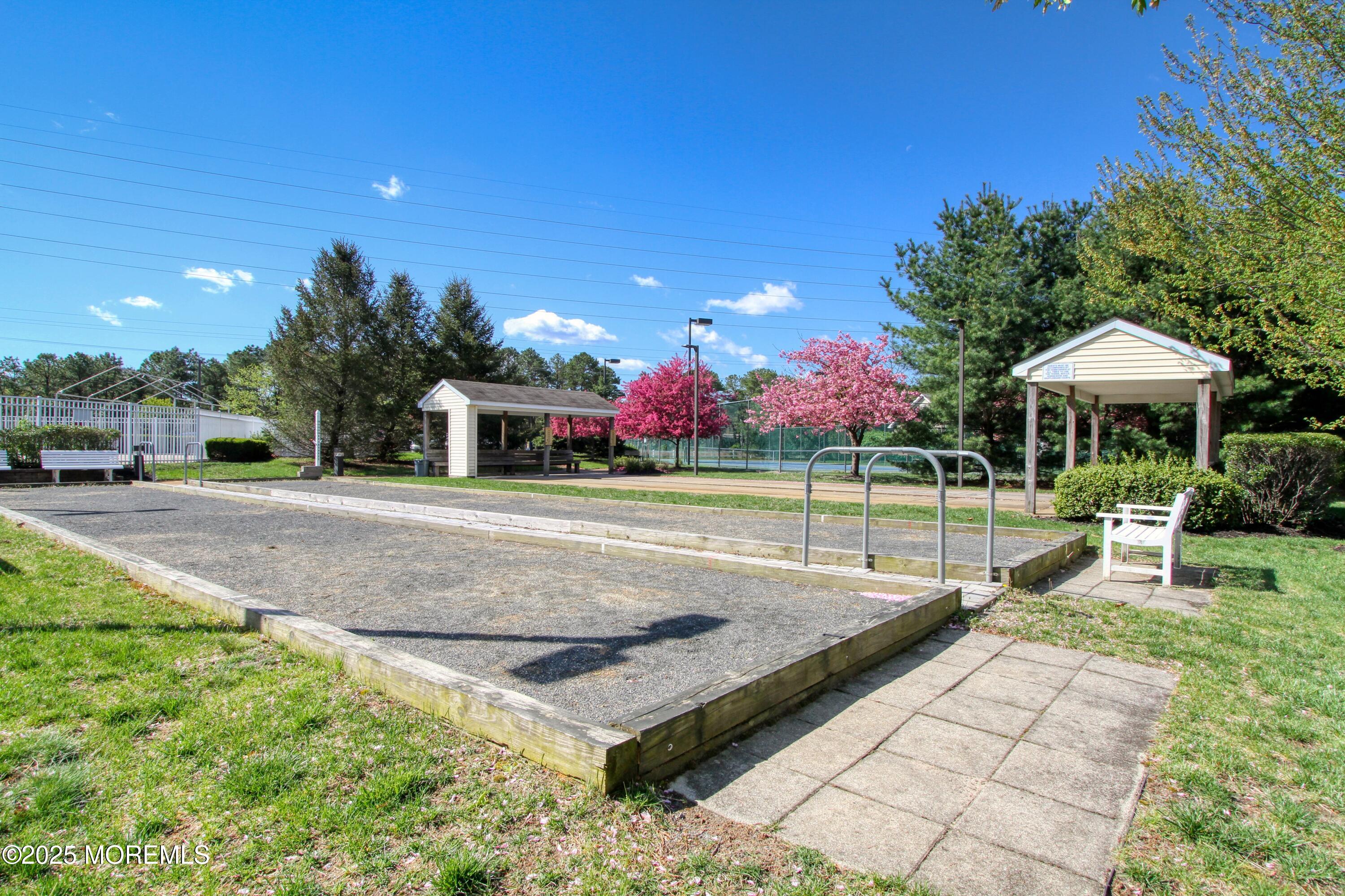 32 Winkle Court Whiting, NJ 08759 - Photo 15 of 18 a swimming pool with outdoor seating and yard