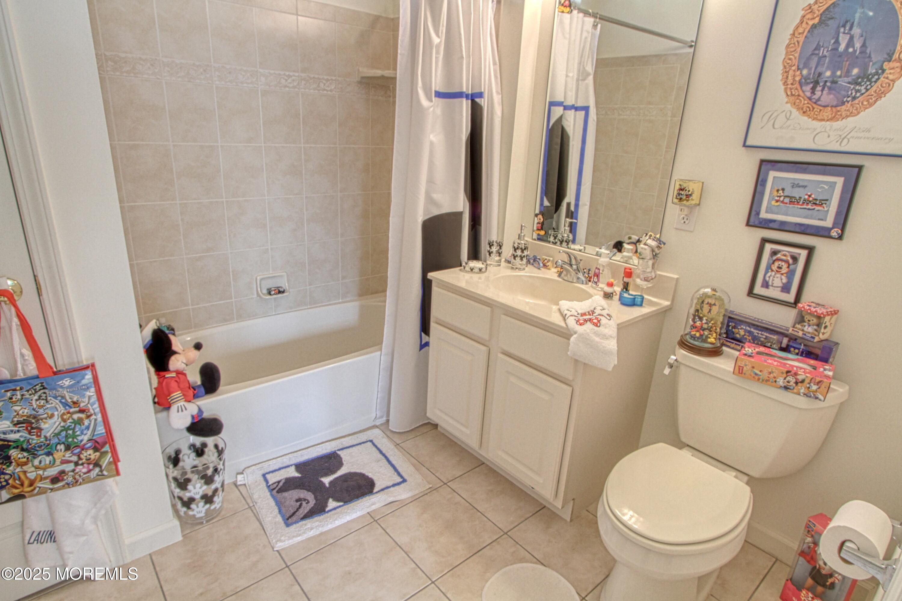 32 Winkle Court Whiting, NJ 08759 - Photo 9 of 18 a bathroom with a sink toilet and bathtub