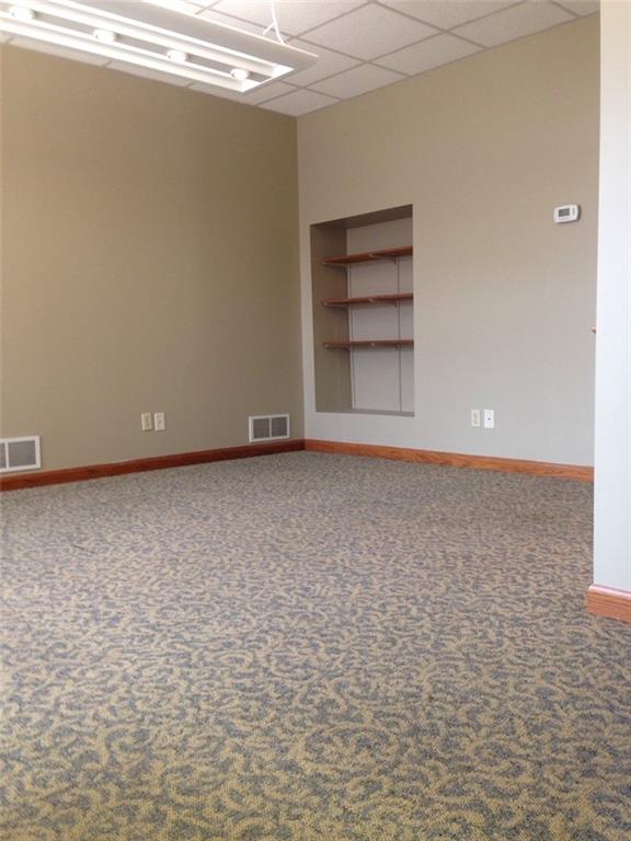 132 West New Castle Street, Unit 1 Butler, PA 16001 - Photo 2 of 8 a view of room with a wooden floor and a window