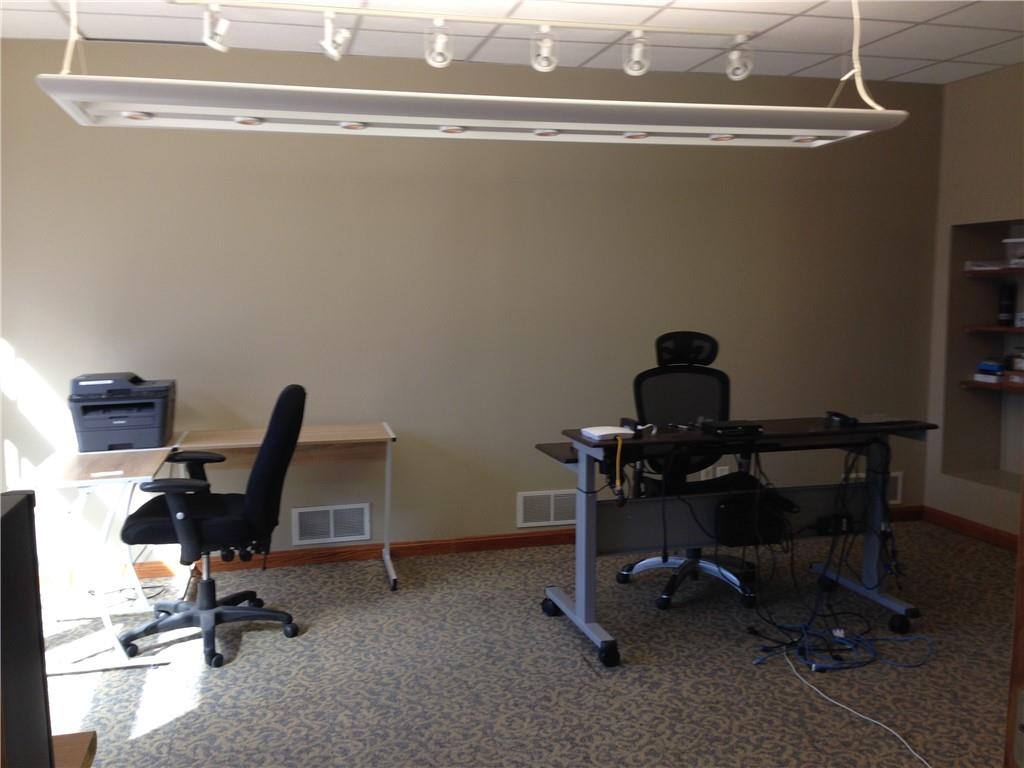 132 West New Castle Street, Unit 1 Butler, PA 16001 - Photo 5 of 8 a view of a workspace with furniture