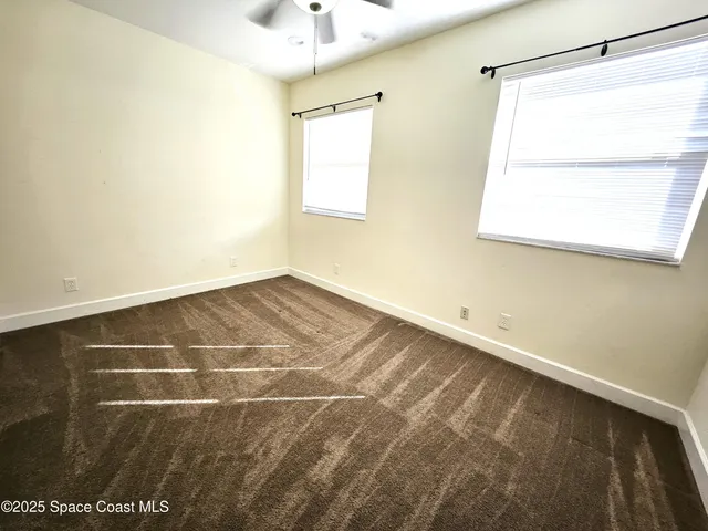 a view of a room with a window