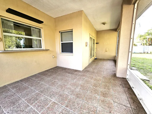 a view of a backyard with a garden