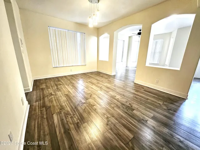 a view of an empty room and window