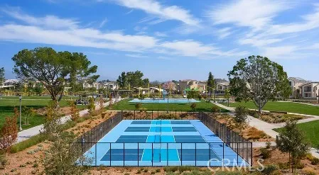 a yard with wooden fence and trees