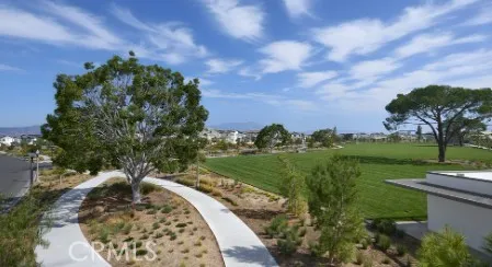 a view of a lake with a yard