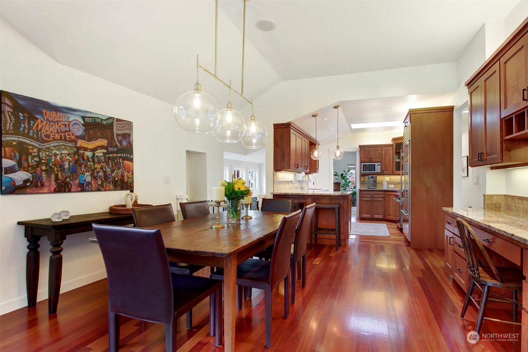 2733 49th Avenue Southwest Seattle, WA 98116 - Photo 12 of 32 a view of a dining room with furniture window and wooden floor