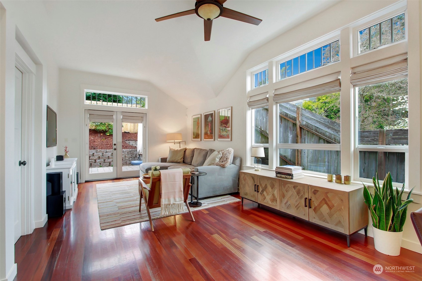 2733 49th Avenue Southwest Seattle, WA 98116 - Photo 14 of 32 a living room with furniture fireplace and wooden floor