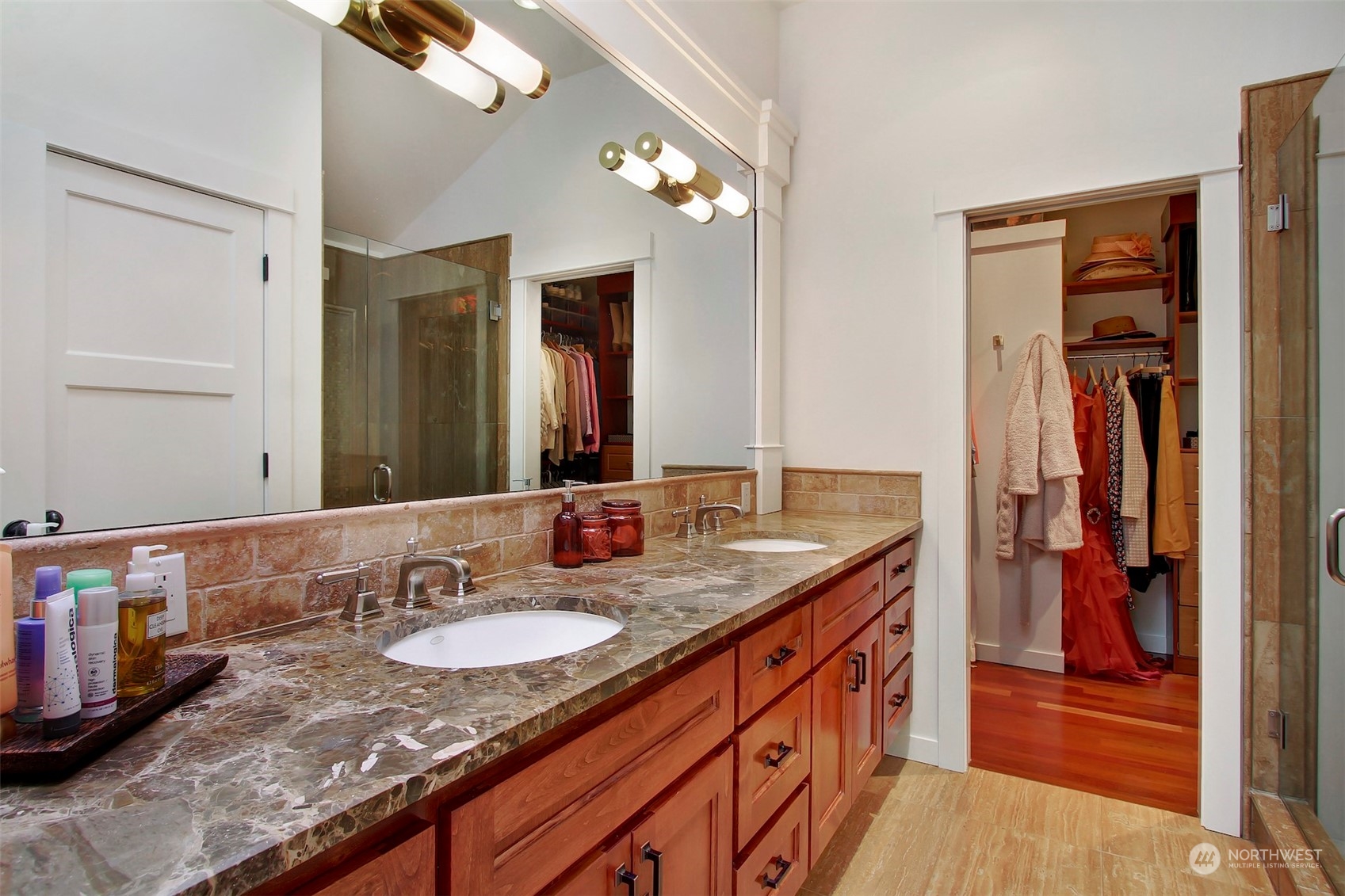 2733 49th Avenue Southwest Seattle, WA 98116 - Photo 19 of 32 a bathroom with a granite countertop sink and a mirror