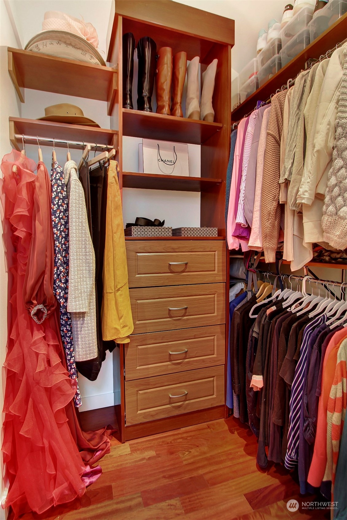 2733 49th Avenue Southwest Seattle, WA 98116 - Photo 20 of 32 a view of walk in closet with clothes and shoes