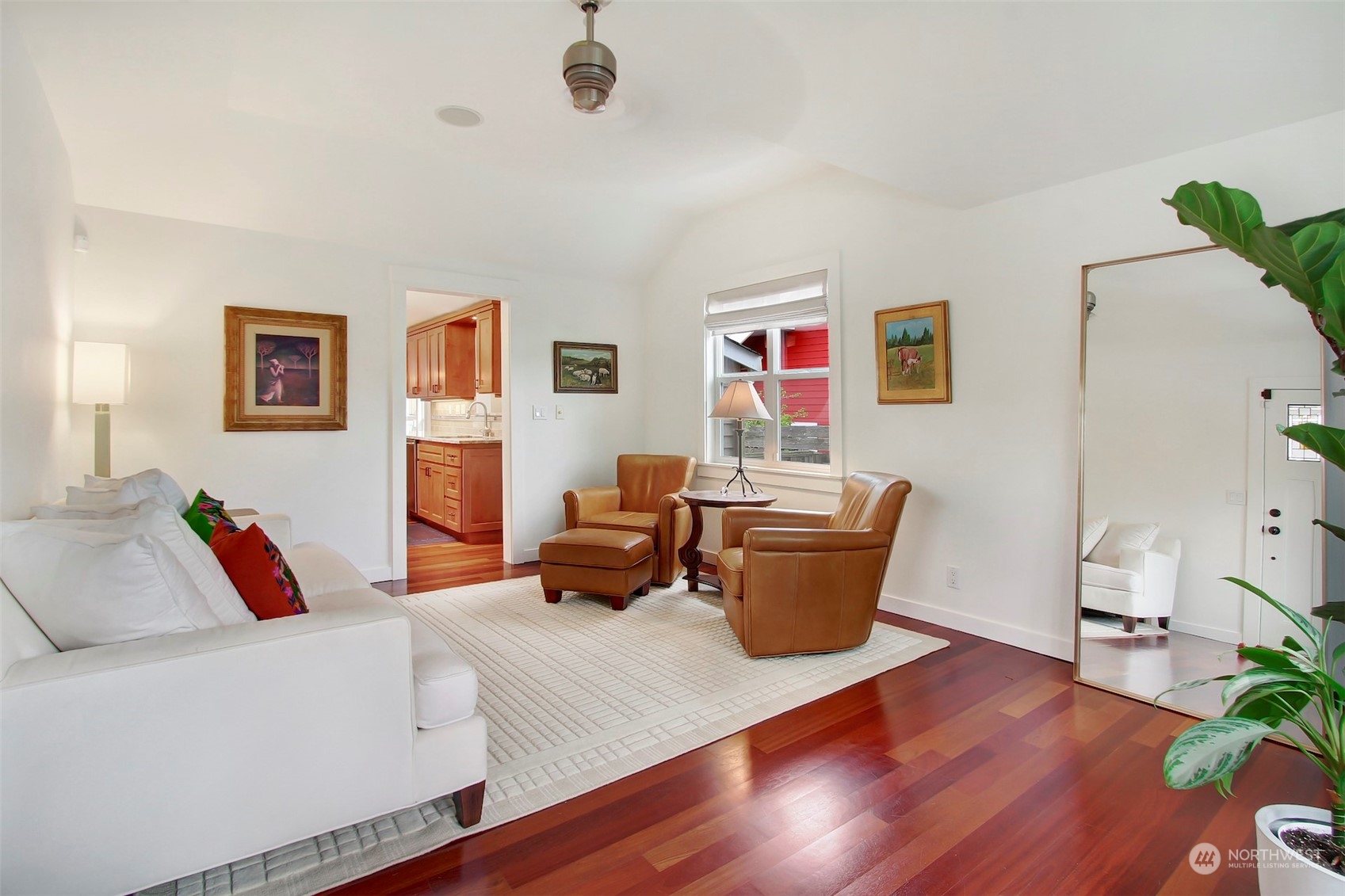 2733 49th Avenue Southwest Seattle, WA 98116 - Photo 3 of 32 a living room with furniture and painting on the wall
