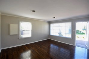 203 James Avenue Franklin, TN 37064 - Photo 21 of 23 a view of an empty room with wooden floor and a window