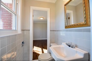 203 James Avenue Franklin, TN 37064 - Photo 8 of 23 a bathroom with a sink toilet and mirror
