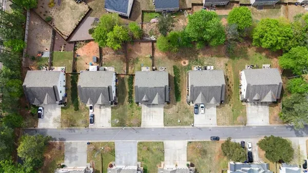 an aerial view of city and sign board