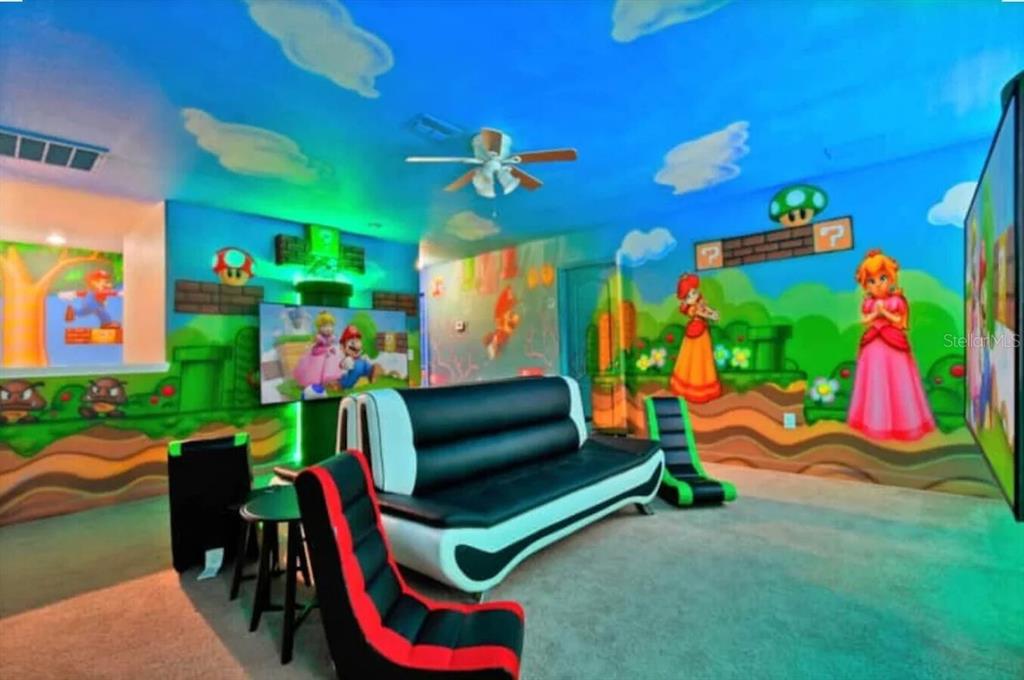 1424 Thunderbird Road Davenport, FL 33896 - Photo 17 of 22 a outdoor space with lots of furniture and entertaining space