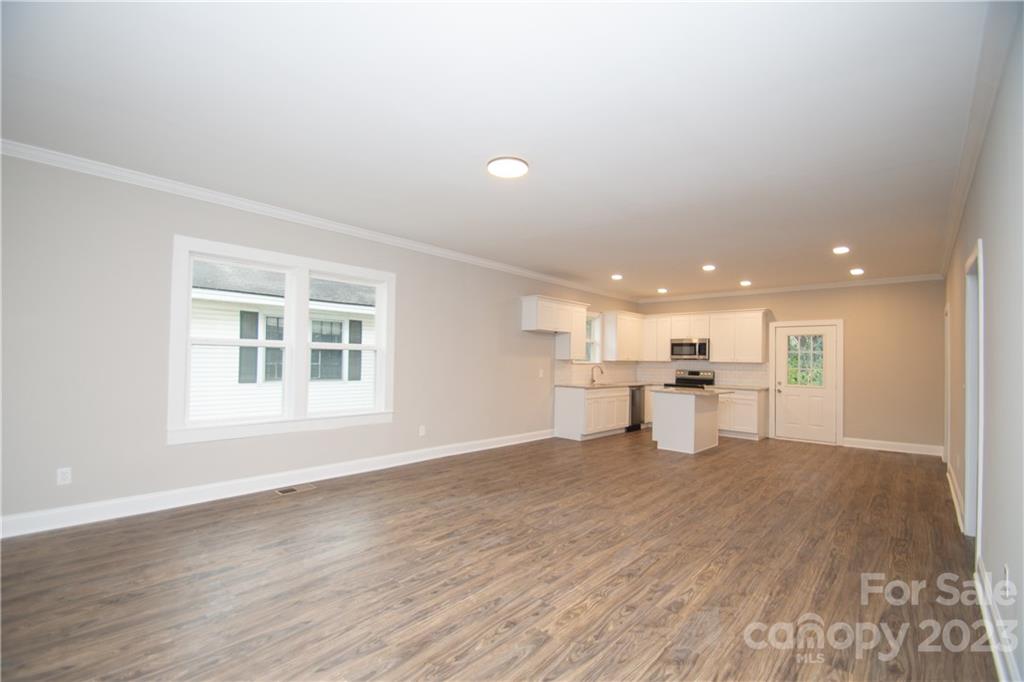 1257 Springdale Road Lancaster, SC 29720 - Photo 4 of 18 a view of a kitchen with a sink and microwave