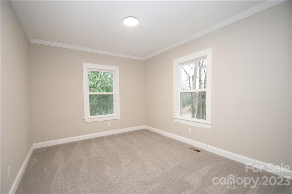 1257 Springdale Road Lancaster, SC 29720 - Photo 6 of 18 an empty room with a window