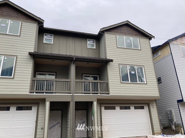 4865 Talbot Road South, Unit B4 Renton, WA 98055 - Photo 1 of 33 a front view of a house