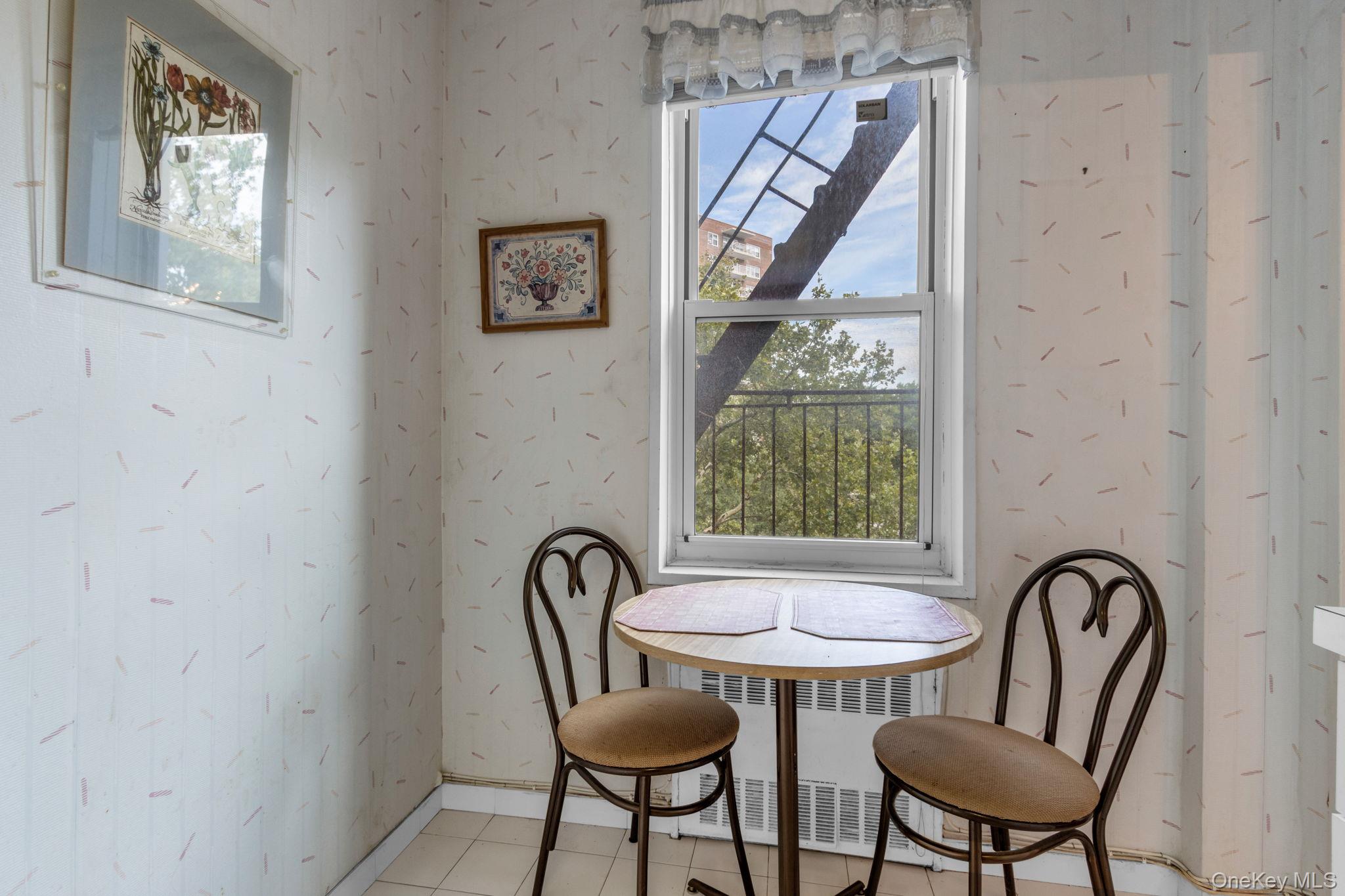 3901 Independence Avenue, Unit 4R Bronx, NY 10463 - Photo 13 of 35 a view of a dining room with furniture and a window