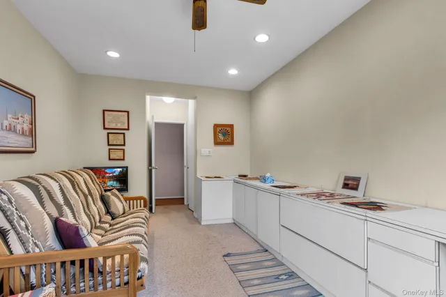 a hallway with a couch and a couch