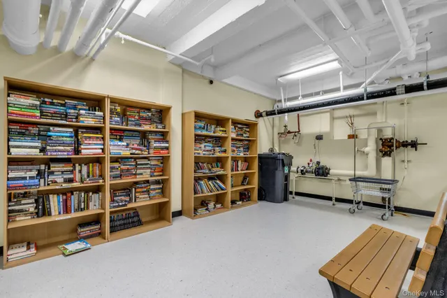 a room with furniture and gym equipment