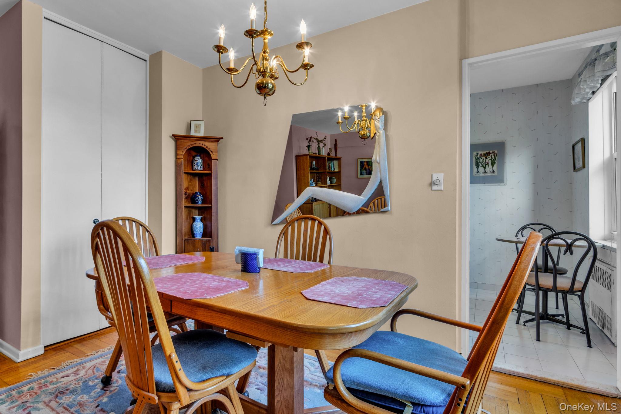 3901 Independence Avenue, Unit 4R Bronx, NY 10463 - Photo 6 of 35 a view of a dining room with furniture and wooden floor