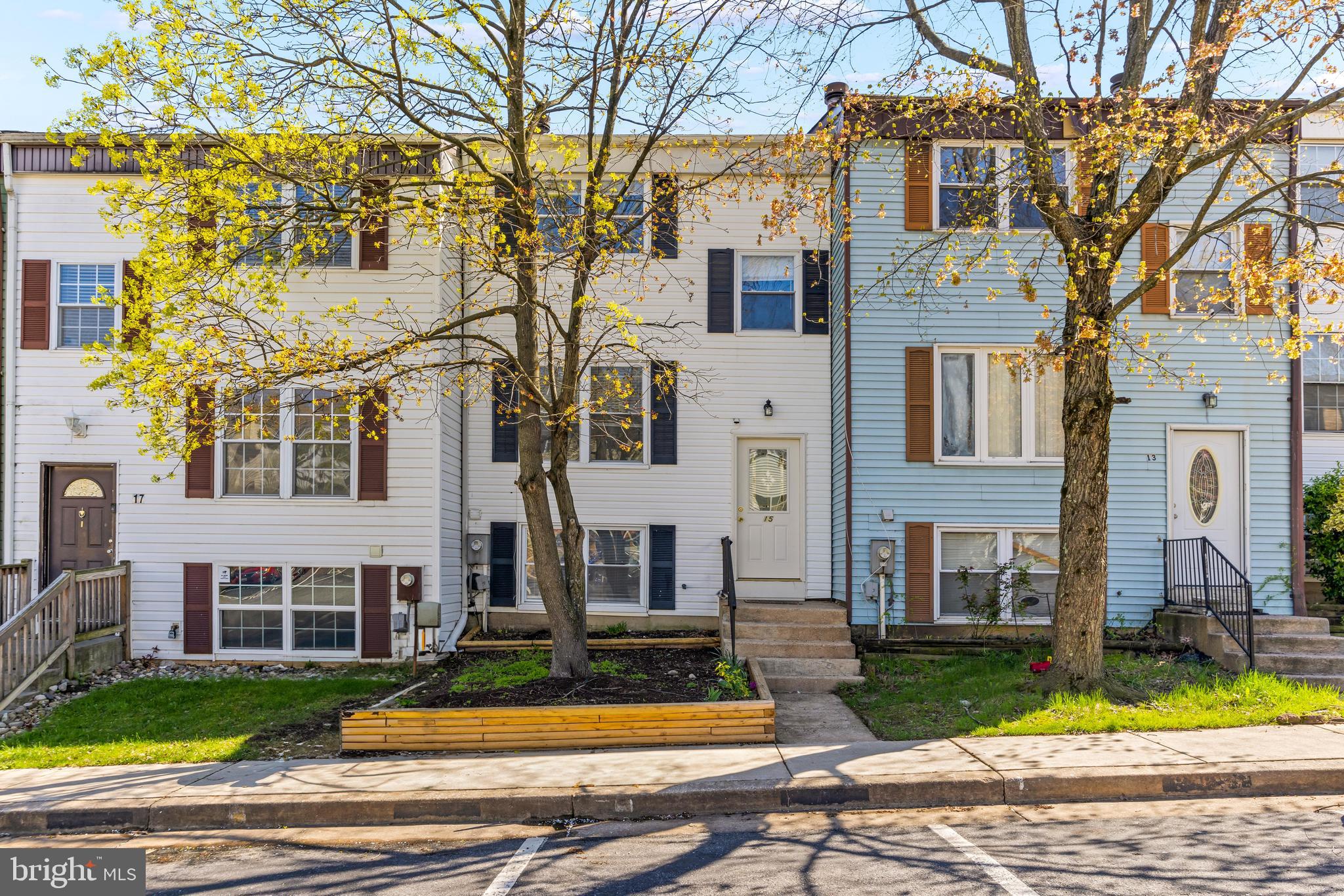front view of a building with a yard