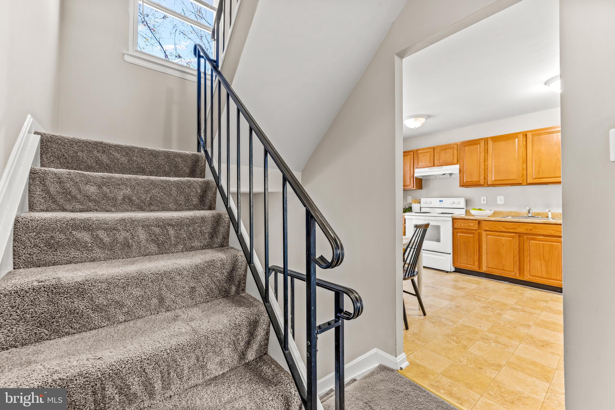 15 Bohn Court Rosedale, MD 21237 - Photo 14 of 31 a view of entryway and hall with wooden floor