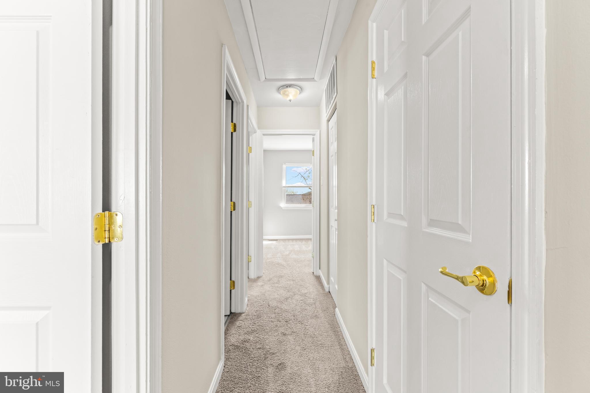 15 Bohn Court Rosedale, MD 21237 - Photo 15 of 31 a view of a hallway with wooden floor