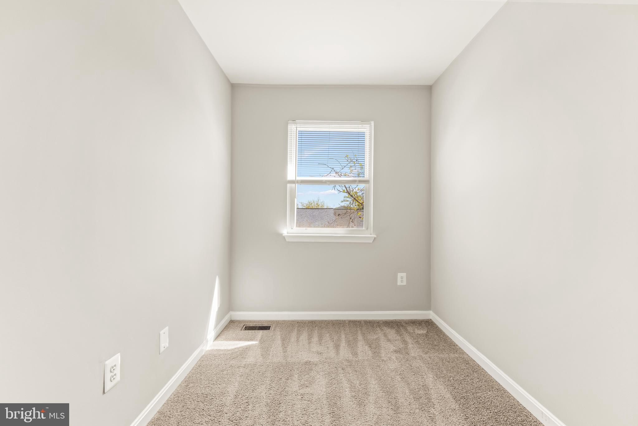 15 Bohn Court Rosedale, MD 21237 - Photo 17 of 31 a view of an empty room with a window