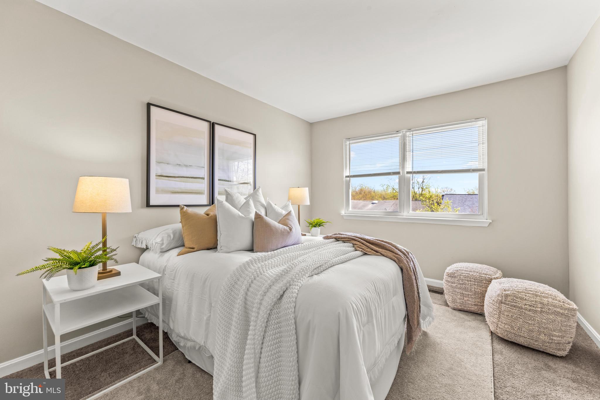 15 Bohn Court Rosedale, MD 21237 - Photo 18 of 31 a bedroom with a bed and a window