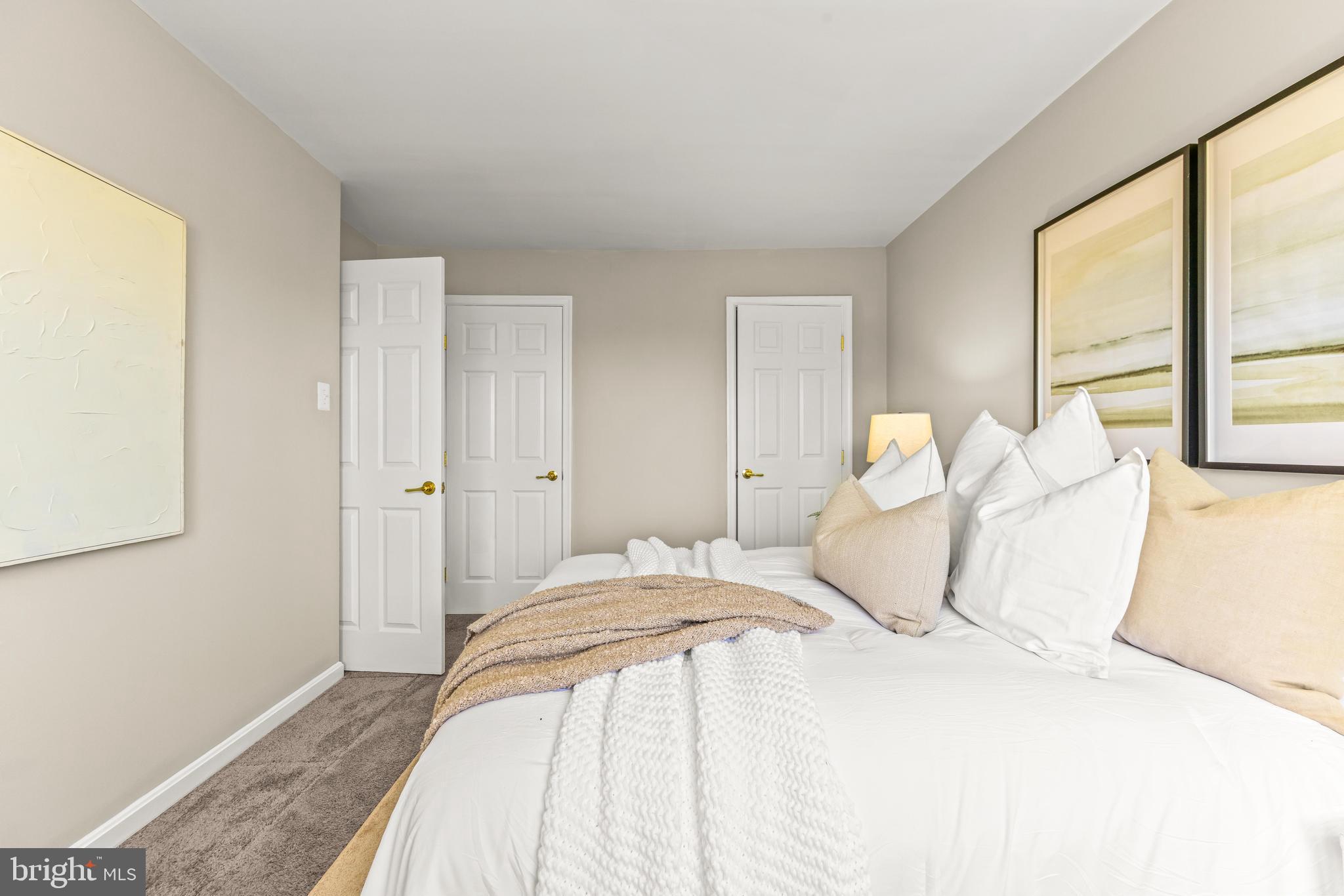 15 Bohn Court Rosedale, MD 21237 - Photo 19 of 31 a bedroom with a bed and a large window