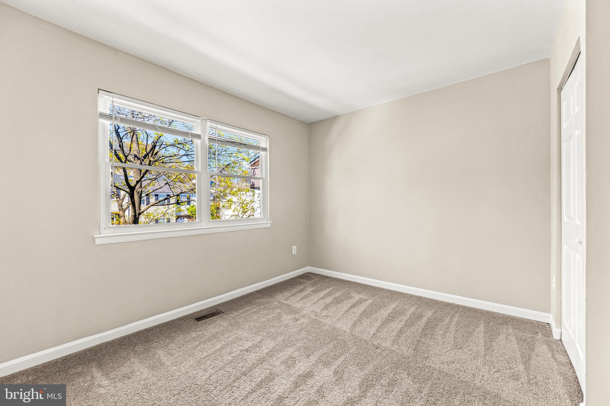 15 Bohn Court Rosedale, MD 21237 - Photo 21 of 31 an empty room with windows