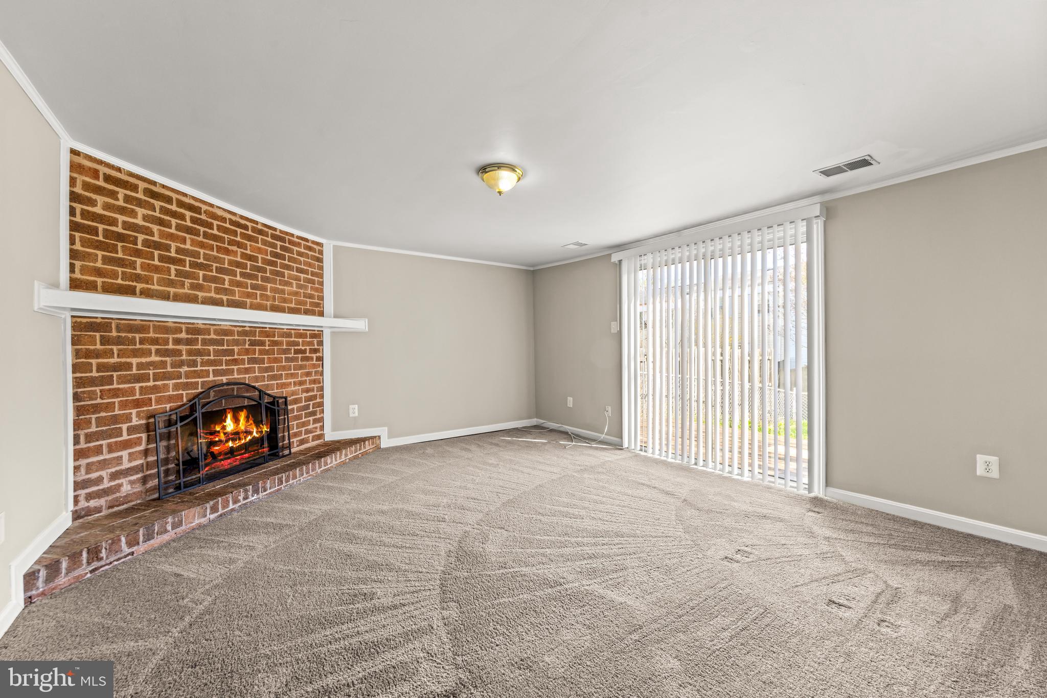15 Bohn Court Rosedale, MD 21237 - Photo 25 of 31 a view of an empty room with a fireplace