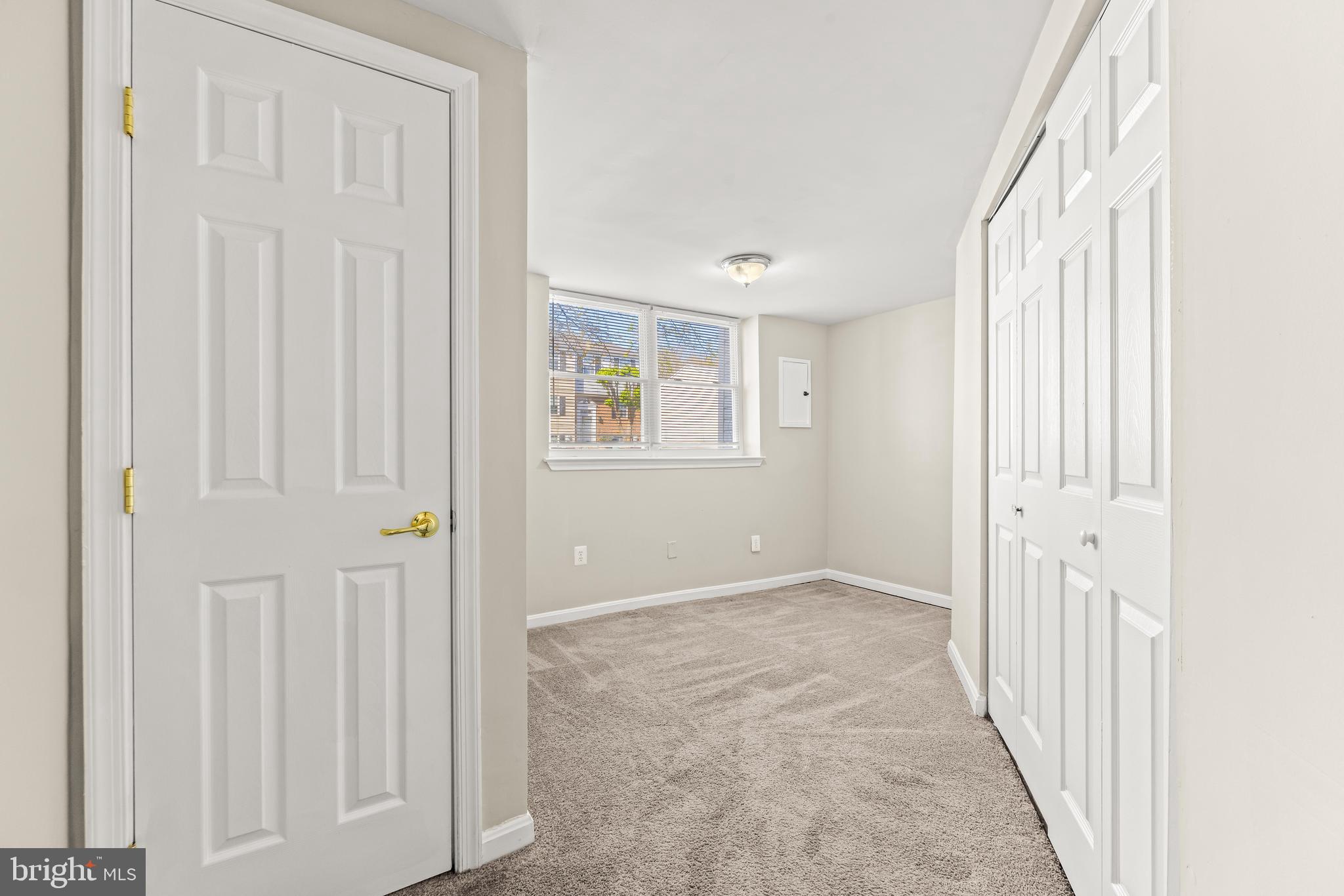 15 Bohn Court Rosedale, MD 21237 - Photo 26 of 31 an empty room with windows