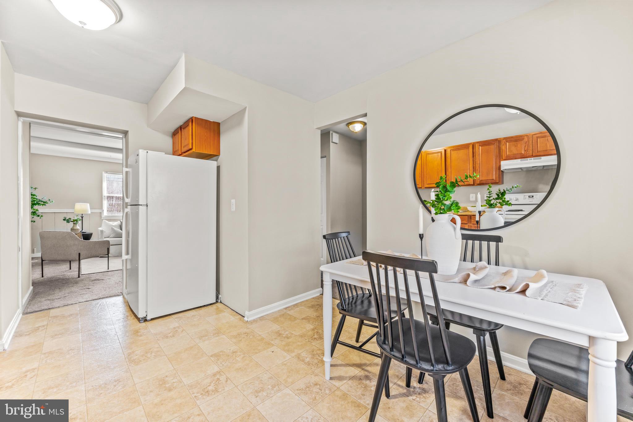 15 Bohn Court Rosedale, MD 21237 - Photo 6 of 31 a view of a dining room with a table and chairs