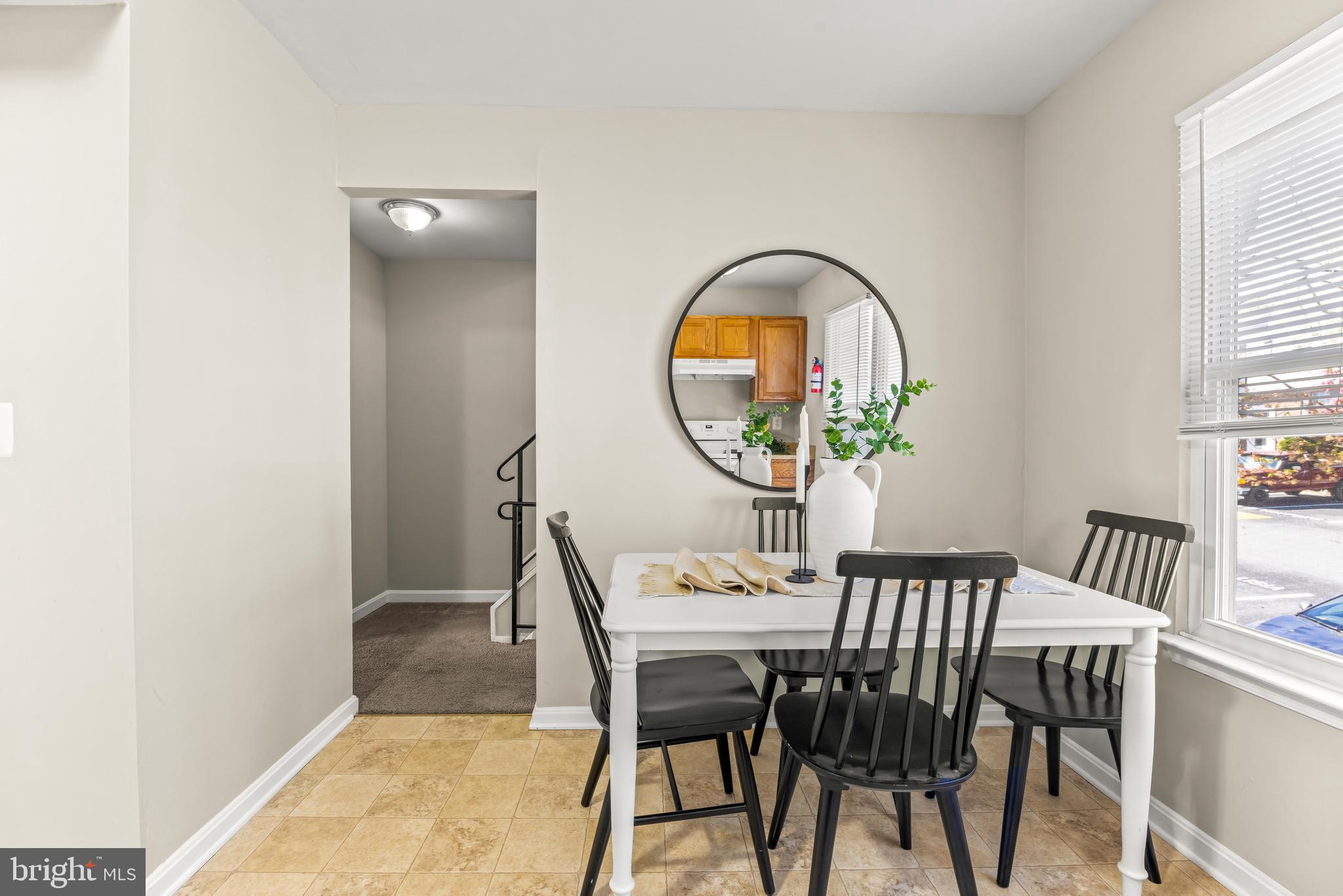 15 Bohn Court Rosedale, MD 21237 - Photo 7 of 31 a view of a dining room with a table and chairs
