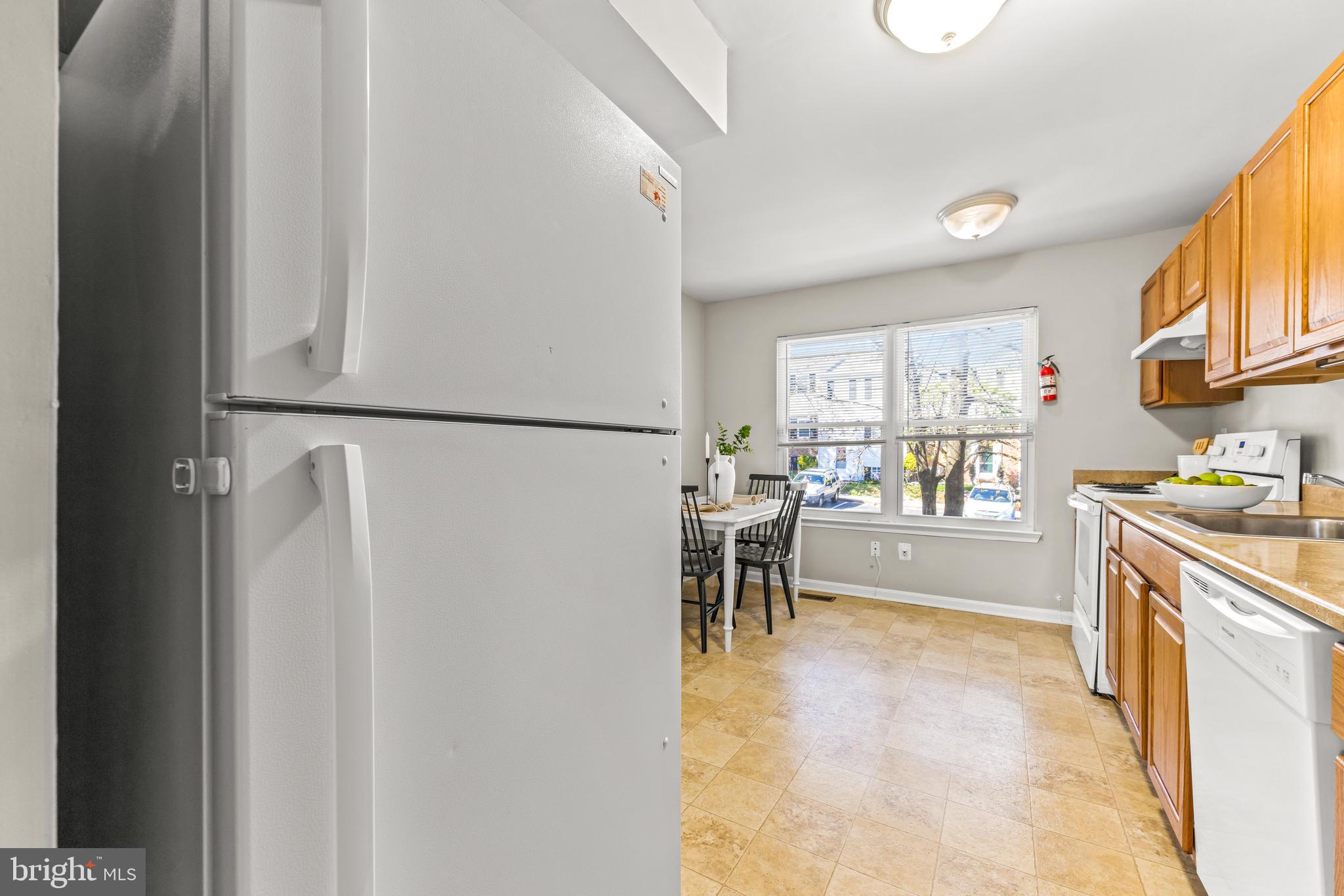15 Bohn Court Rosedale, MD 21237 - Photo 8 of 31 a view of kitchen with furniture and a refrigerator