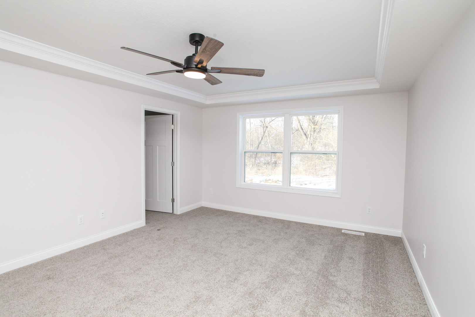 108 Dugan Trail Downs, IL 61736 - Photo 15 of 44 a view of a livingroom with a ceiling fan and window