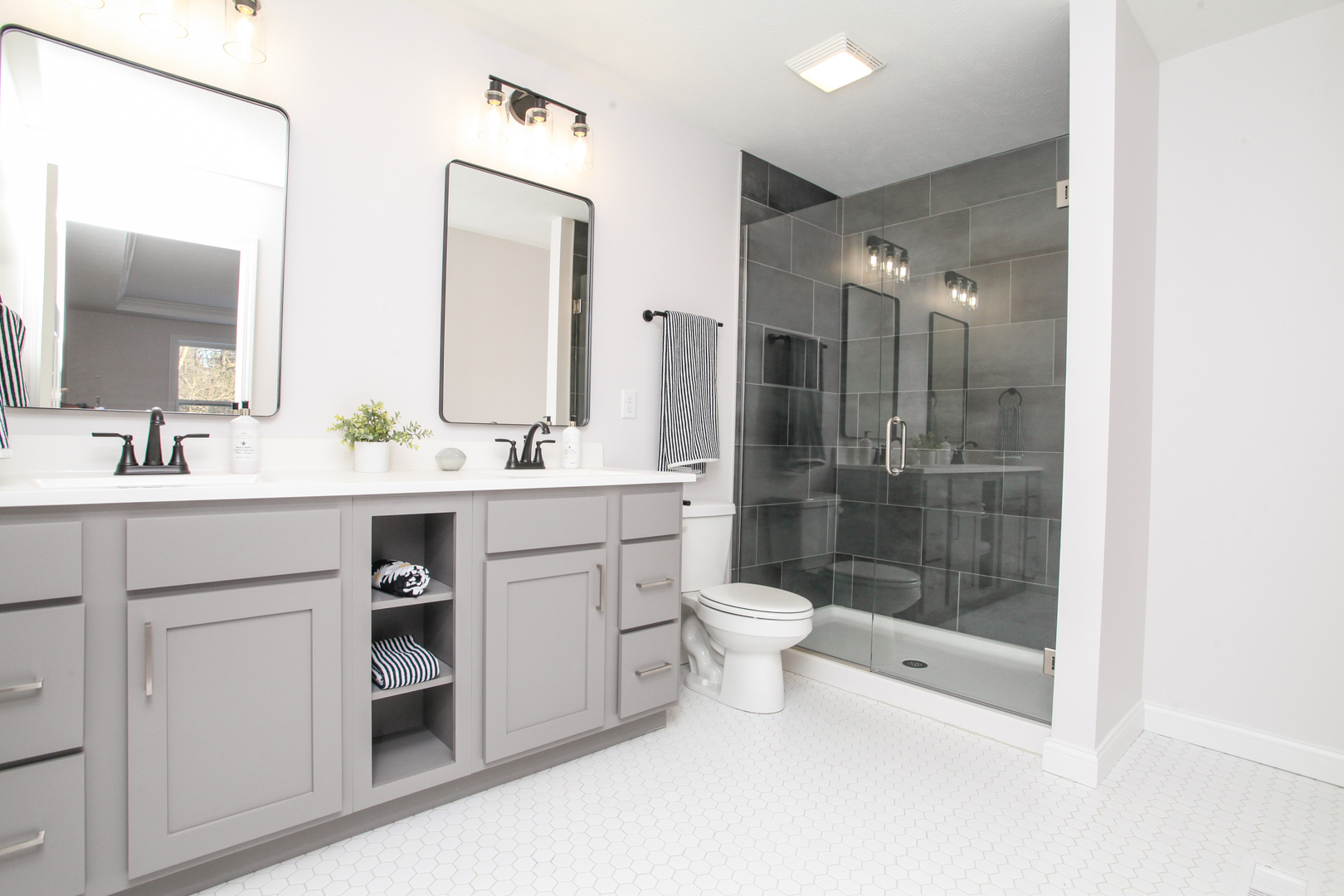 108 Dugan Trail Downs, IL 61736 - Photo 16 of 44 a bathroom with a sink a toilet and shower