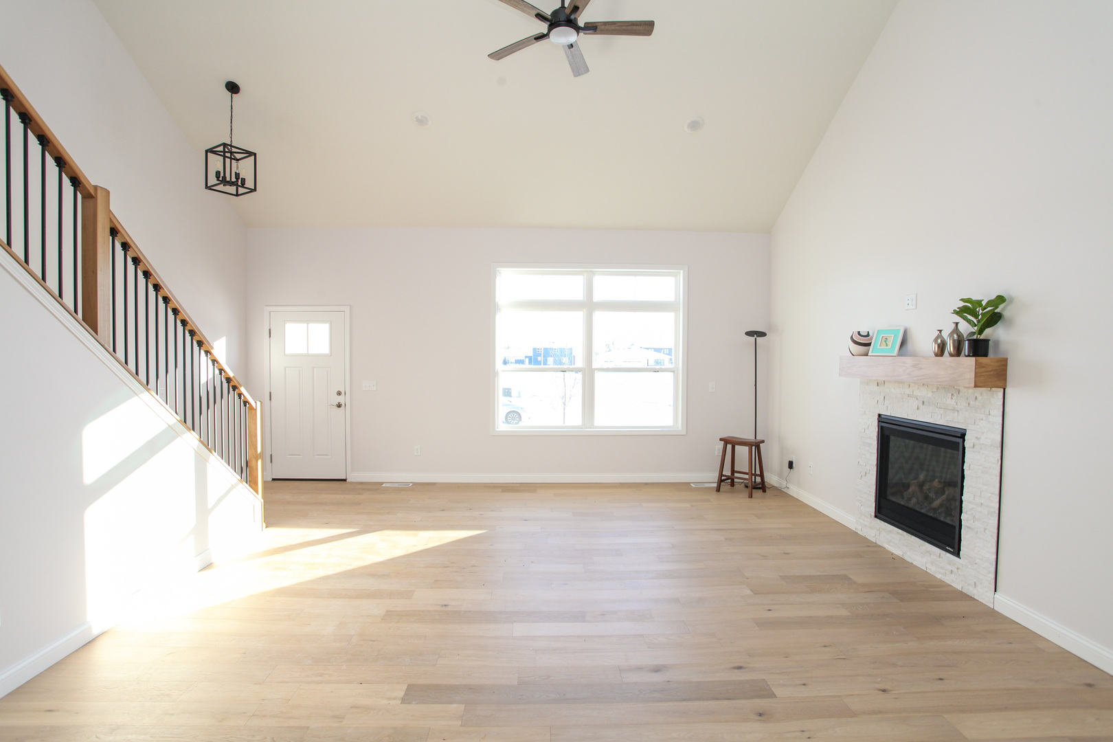 108 Dugan Trail Downs, IL 61736 - Photo 24 of 44 a view of an empty room with a fireplace and a window
