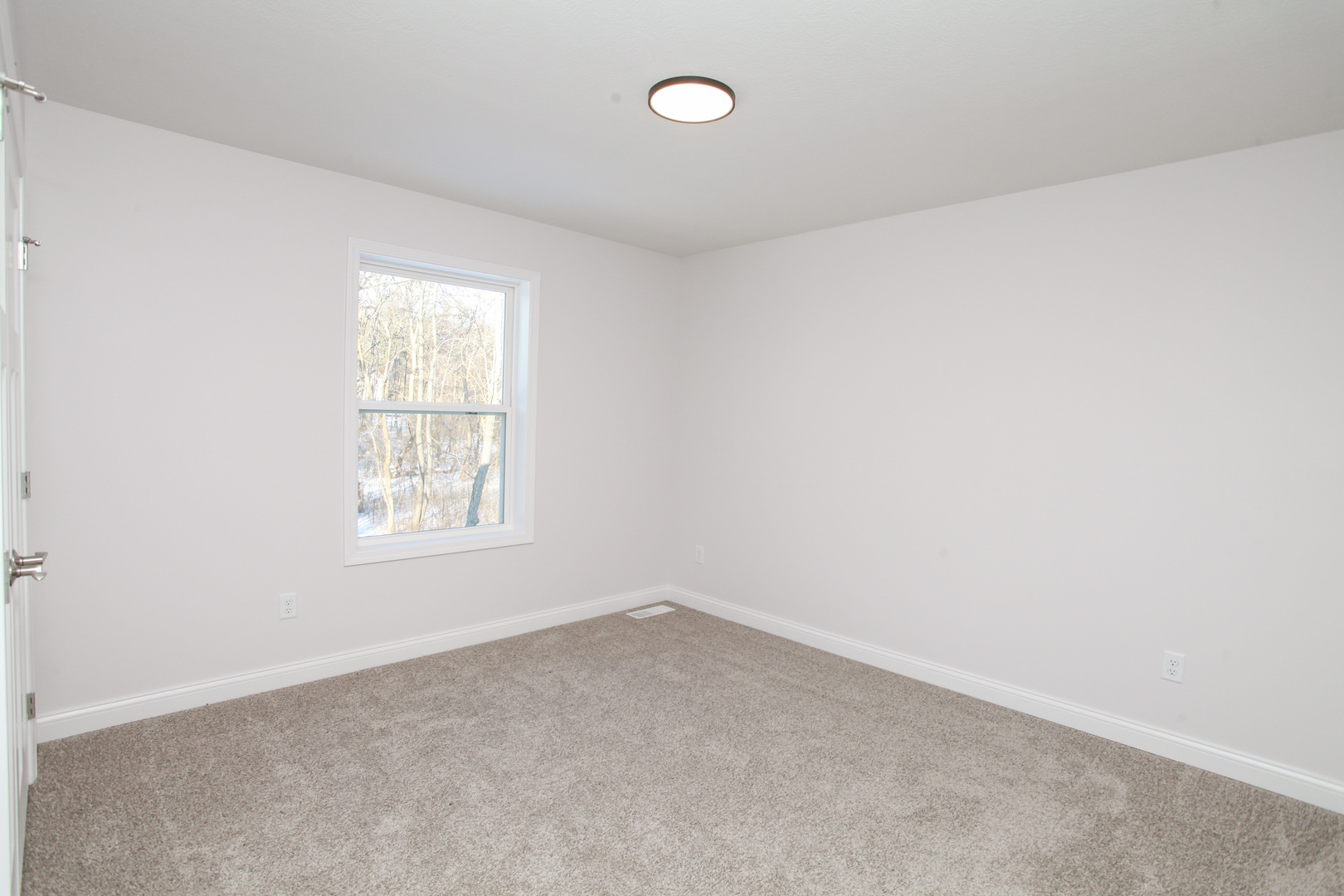 108 Dugan Trail Downs, IL 61736 - Photo 26 of 44 an empty room with a window