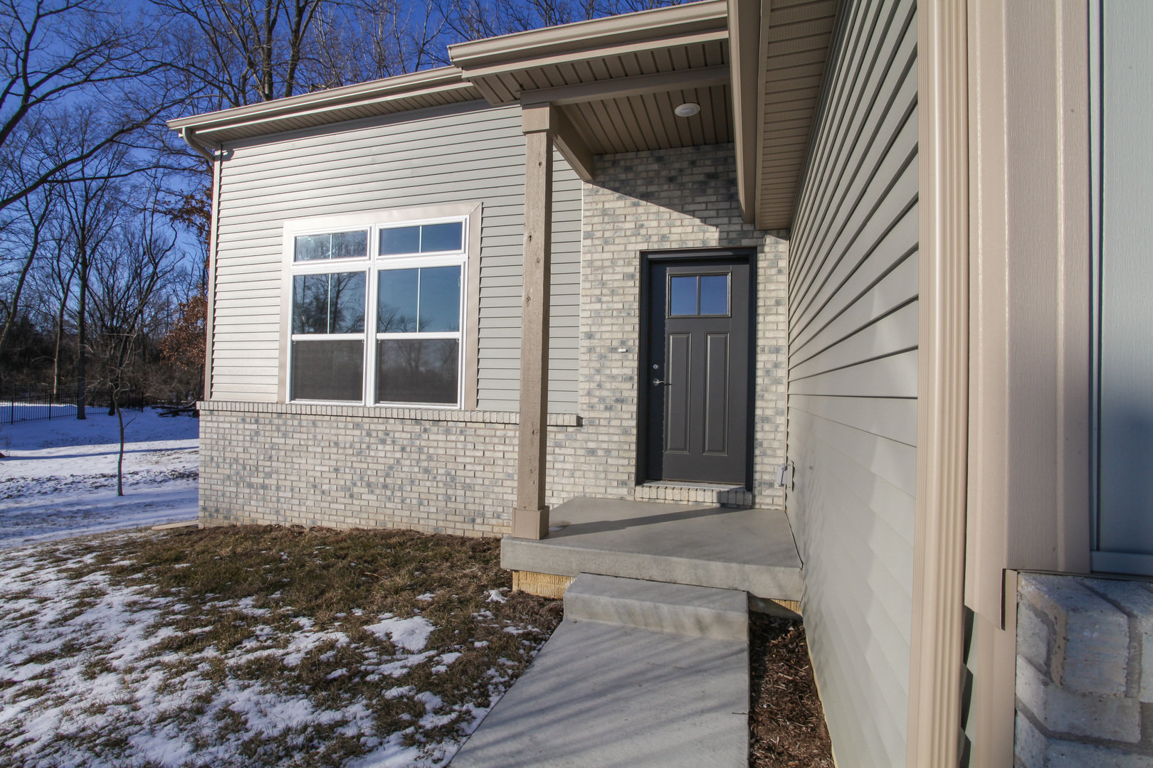 108 Dugan Trail Downs, IL 61736 - Photo 3 of 44 a front view of a house with a yard