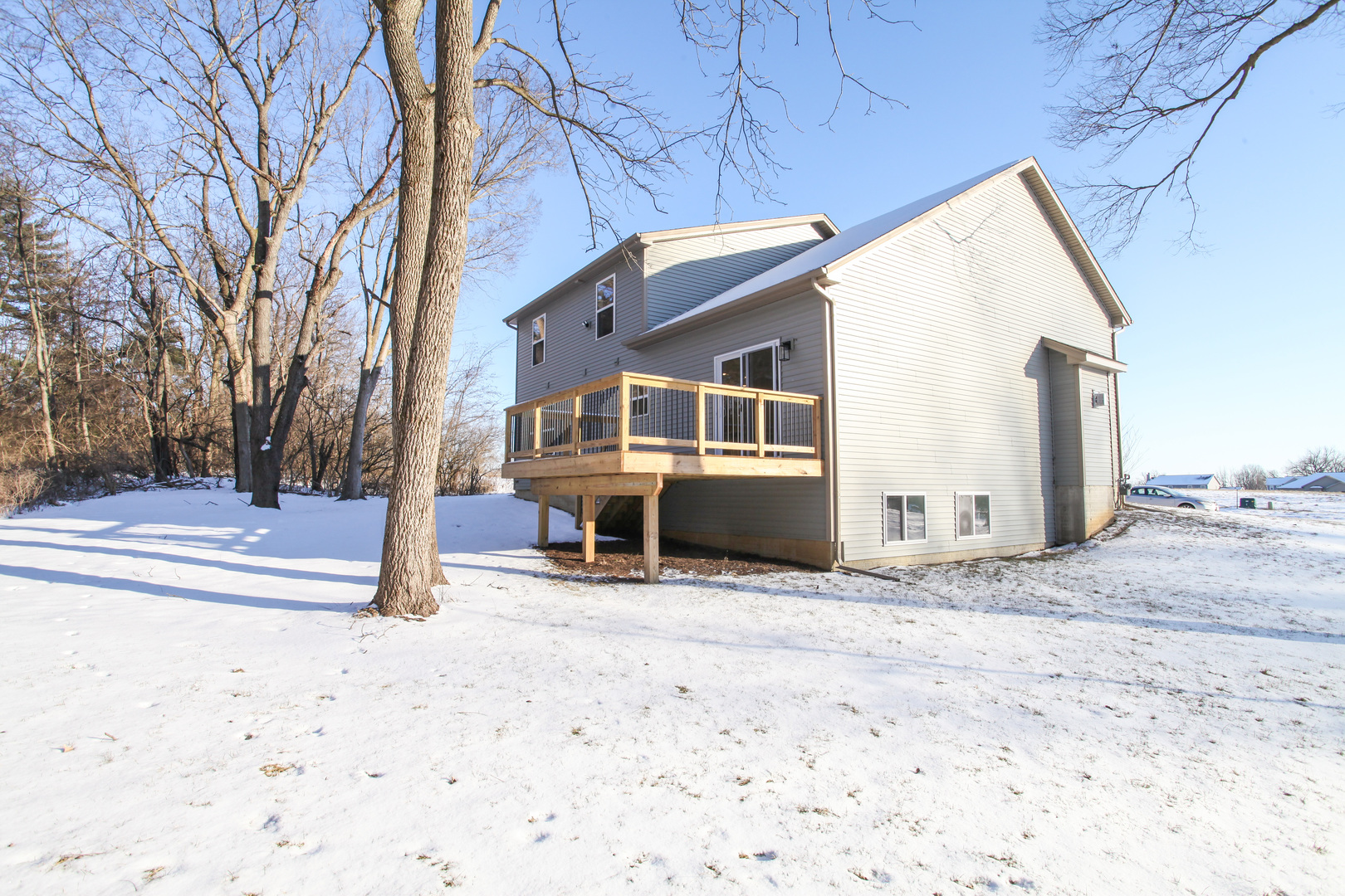108 Dugan Trail Downs, IL 61736 - Photo 42 of 44 a view of a house with snow on the road