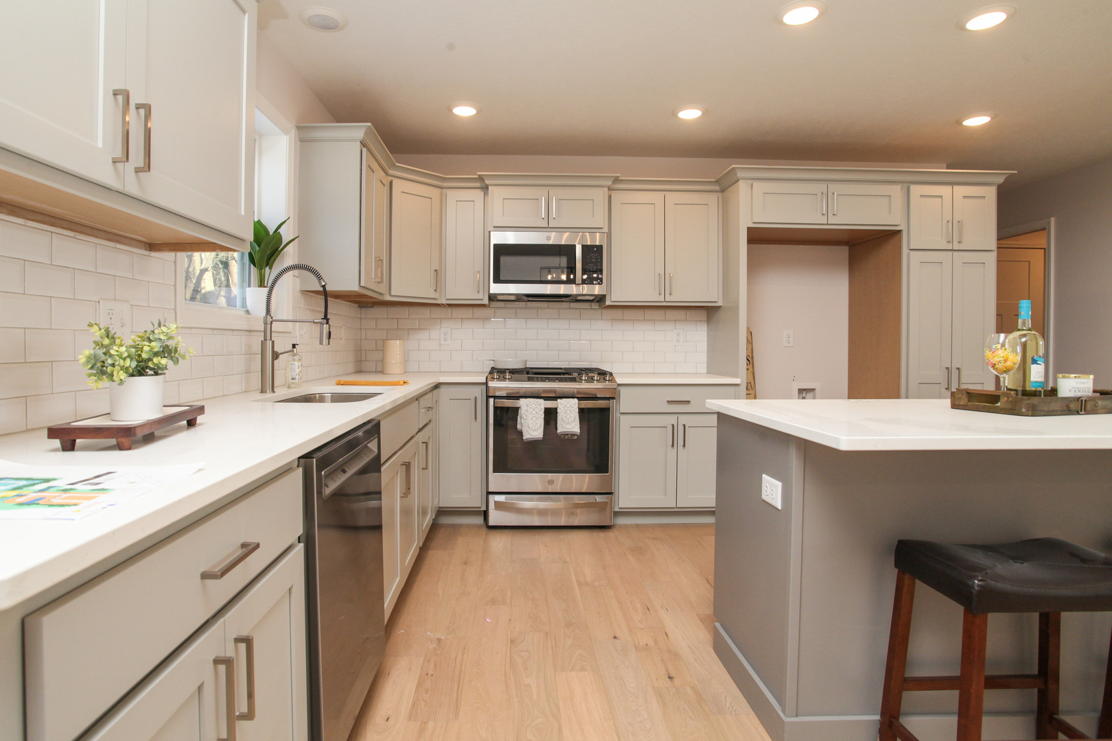 108 Dugan Trail Downs, IL 61736 - Photo 5 of 44 a kitchen with stainless steel appliances granite countertop a sink stove and refrigerator