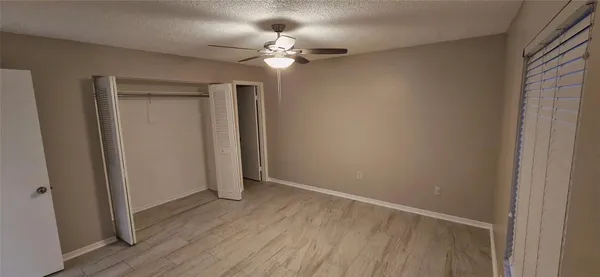 a bathroom with a shower and a toilet