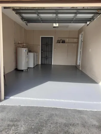 a view of a small room with a window