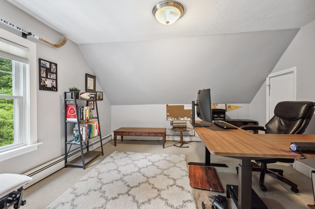 128 Pleasant Street Franklin, MA 02038 - Photo 14 of 19 a view of a workspace with furniture and a window